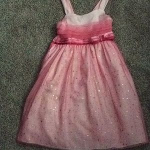 A pink sparkly dress.